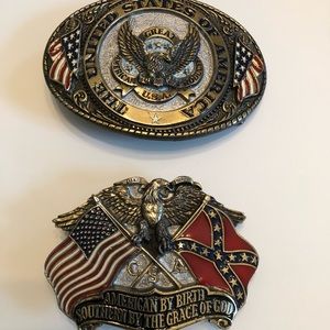 Two men’s belt buckles